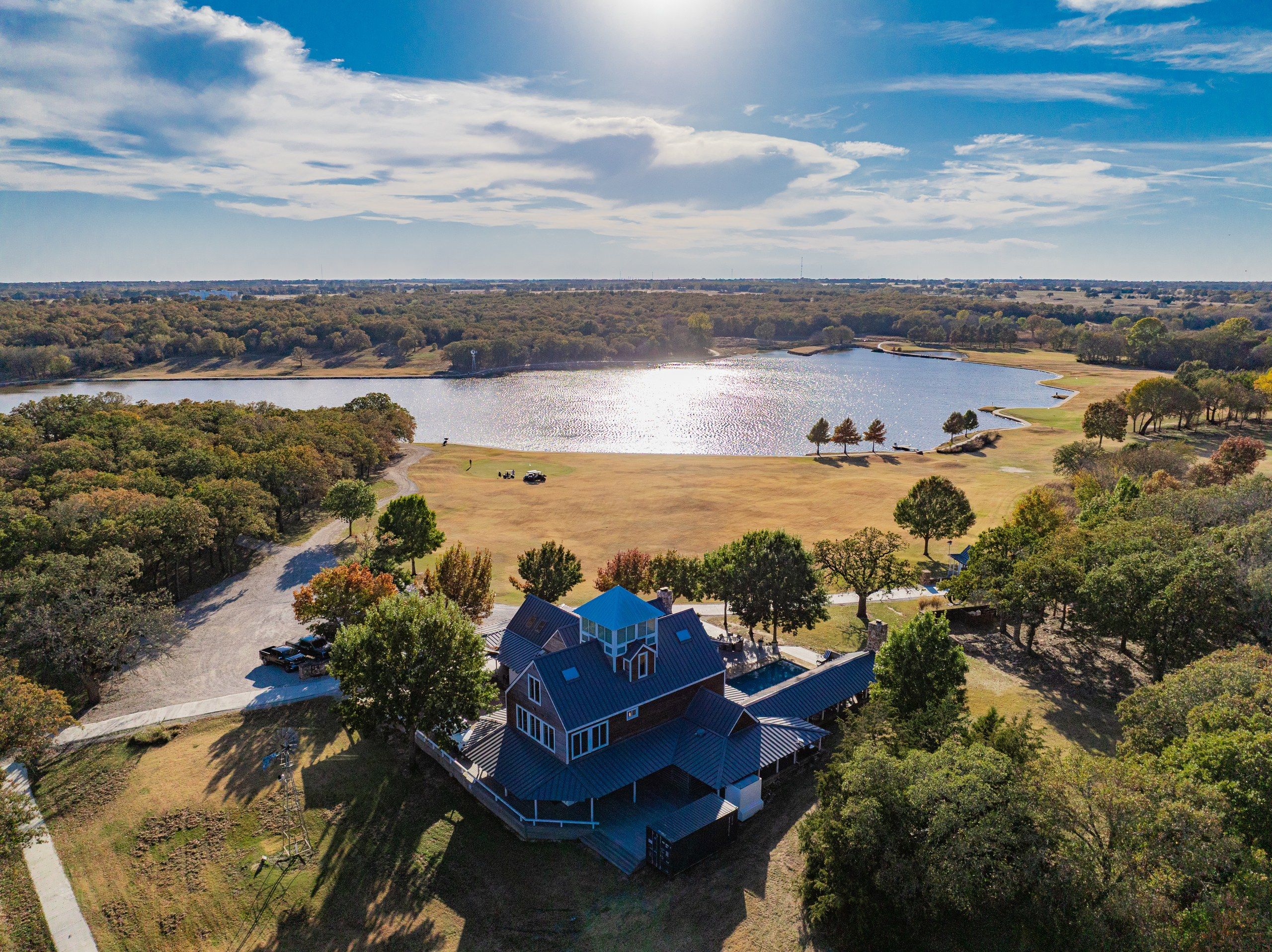 Aerial view of Oak Hills Ranch, working ranch under open Texas sky.